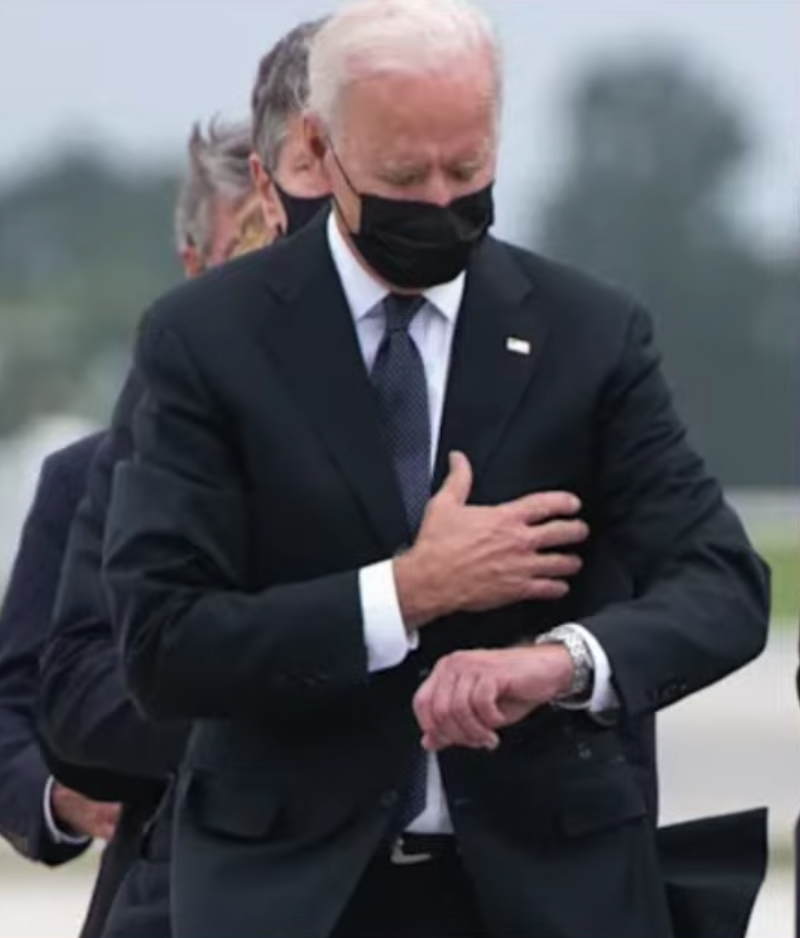 Joe Biden checking his watch - Gabrielle Bourne Media